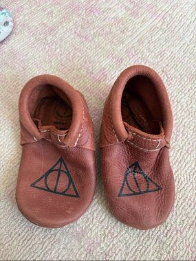 Freshly Picked Brown Leather Baby Moccasins with Black Symbol